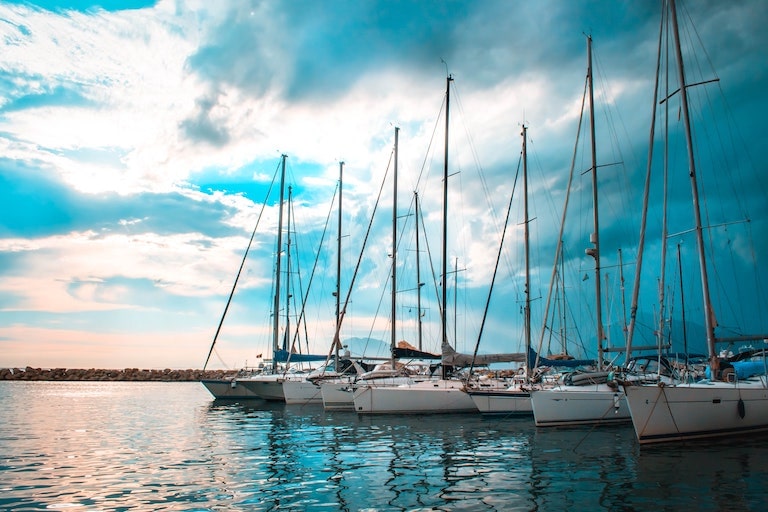 Boats in the bay at sunset.